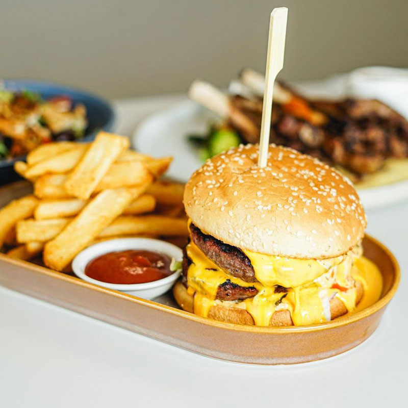 Burger with French fries at Sapid - Restaurant at Burwood Sydney